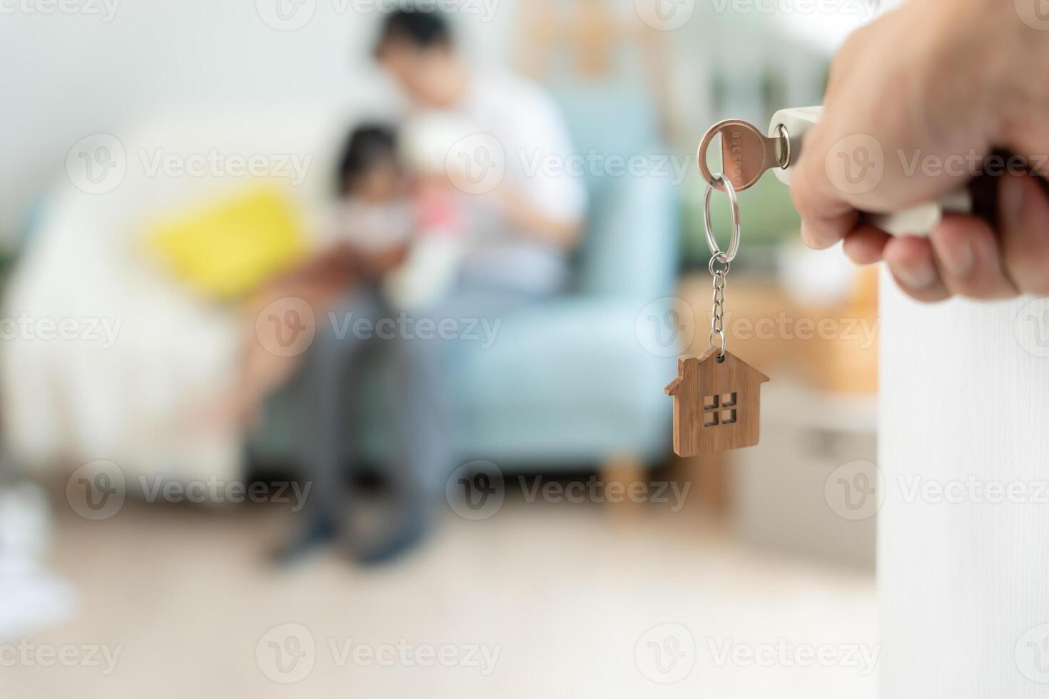 Moving house relocation, Open the door found Family smile and play on new house, inside the room was a cardboard box contain personal belongings and furniture. move in the new apartment or home. photo