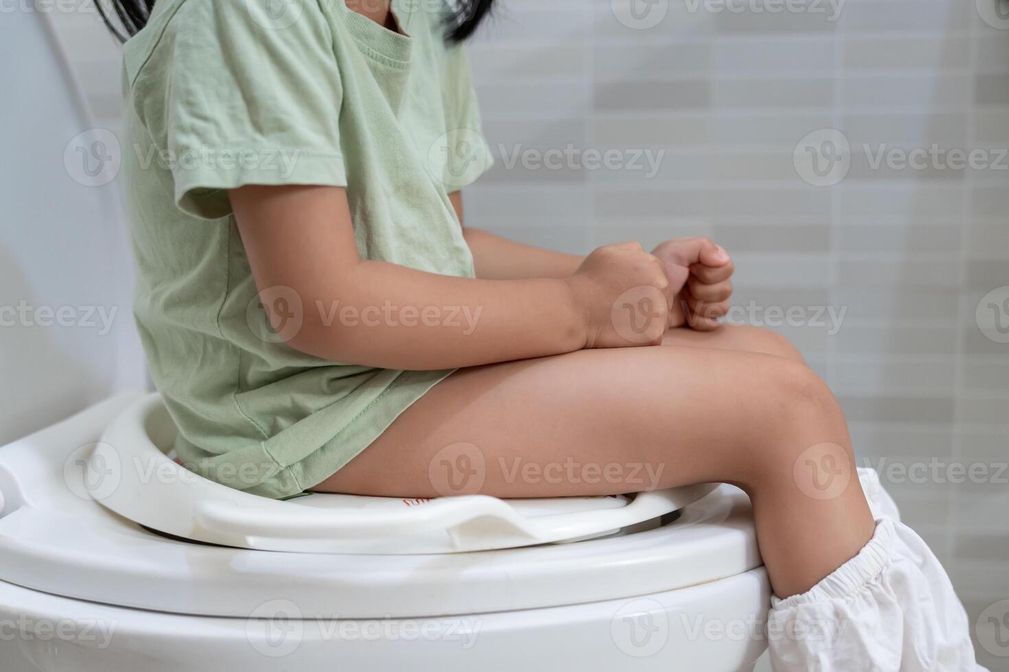 constipation in children, dyspepsia, abdominal pain, crying, defecating, straining, urinary incontinence, blood in the stool, bowel problems, ulcerative colitis, diarrhea photo