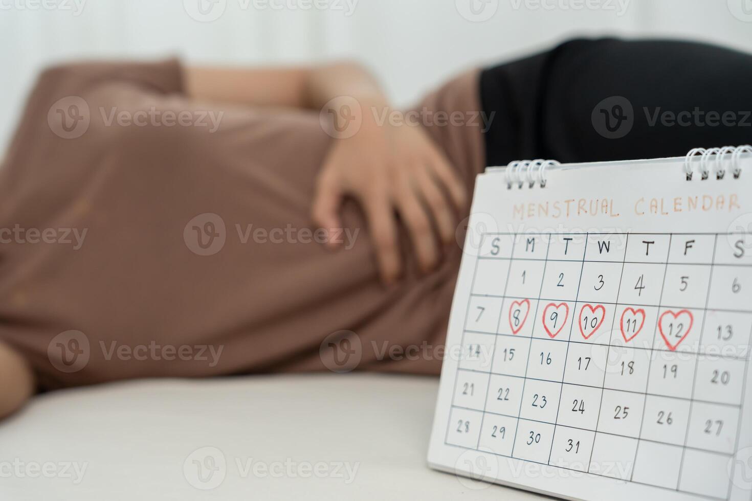 stomach ache. Asian woman have abdominal pain, indigestion, gastritis, menstrual cramps, flatulence, diarrhea, distention, colon cancer, belly inflammation problem, suffer food poisoning, abdomen photo
