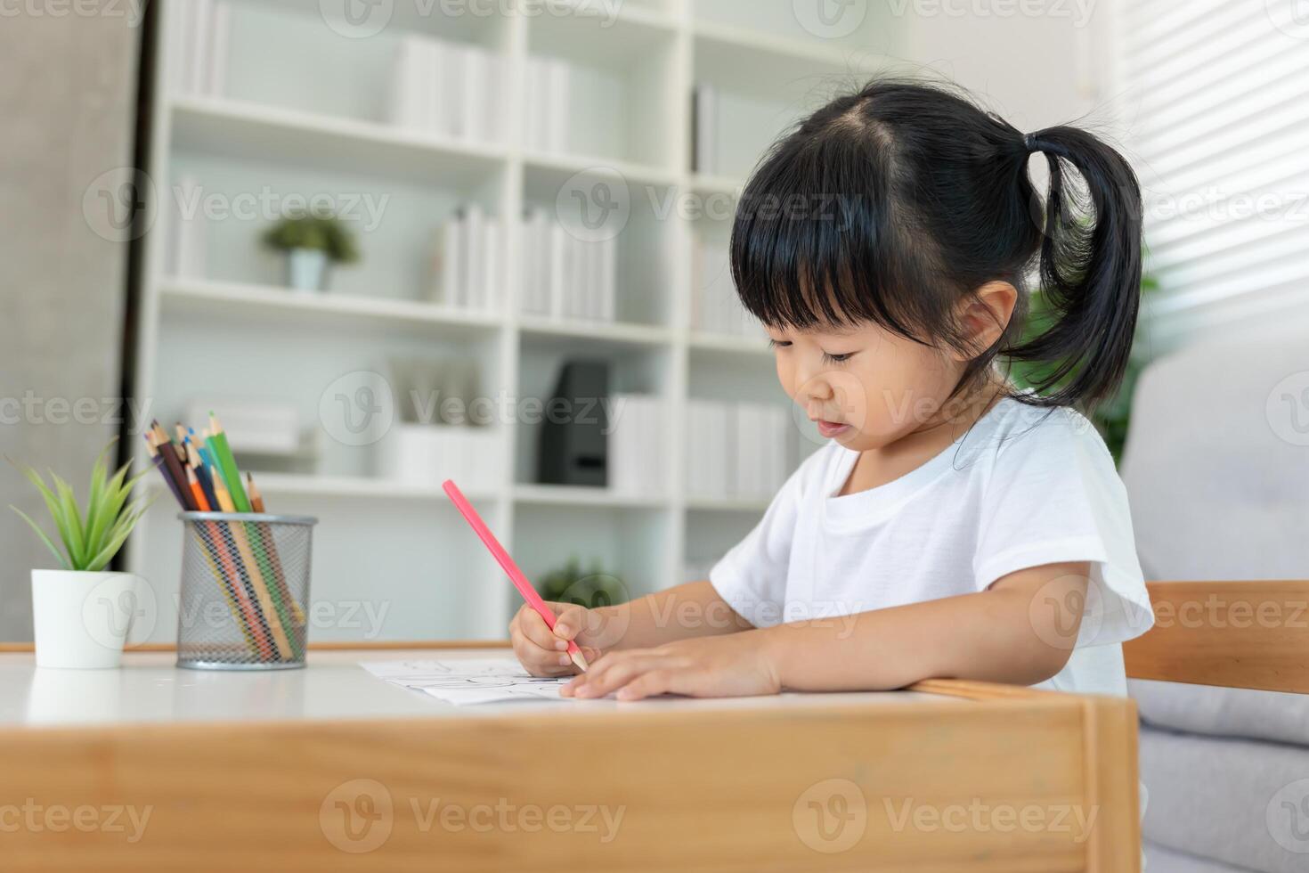 Happy Asian children playing learning paint on paper. Activity, development, IQ, EQ, meditation, brain, muscles, essential skills, family having fun spending time together. Holiday photo