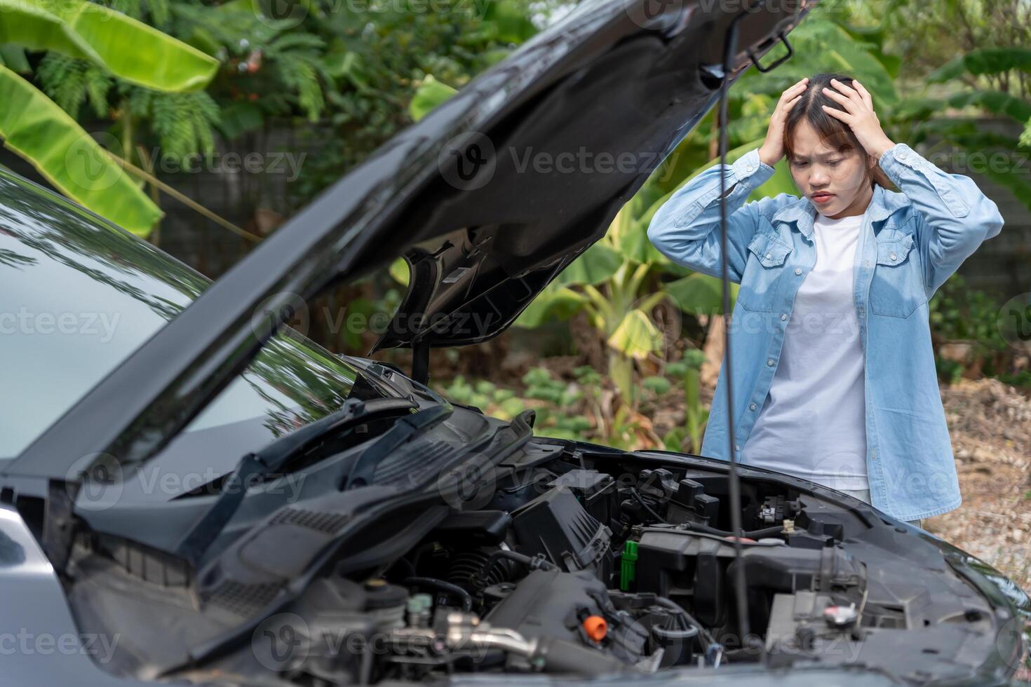 breakdown, broken car, repair, Stress Woman look engine during car accident . Find garage to get car fixed during country tour, waiting for help, emergency. photo