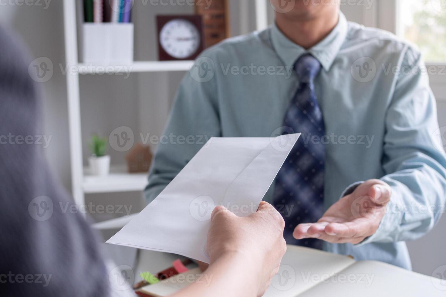 Stressful business women will resign from the company. Working female pass on document resign of manager. resignation, job placement and vacancies concept, career problem, problem life photo