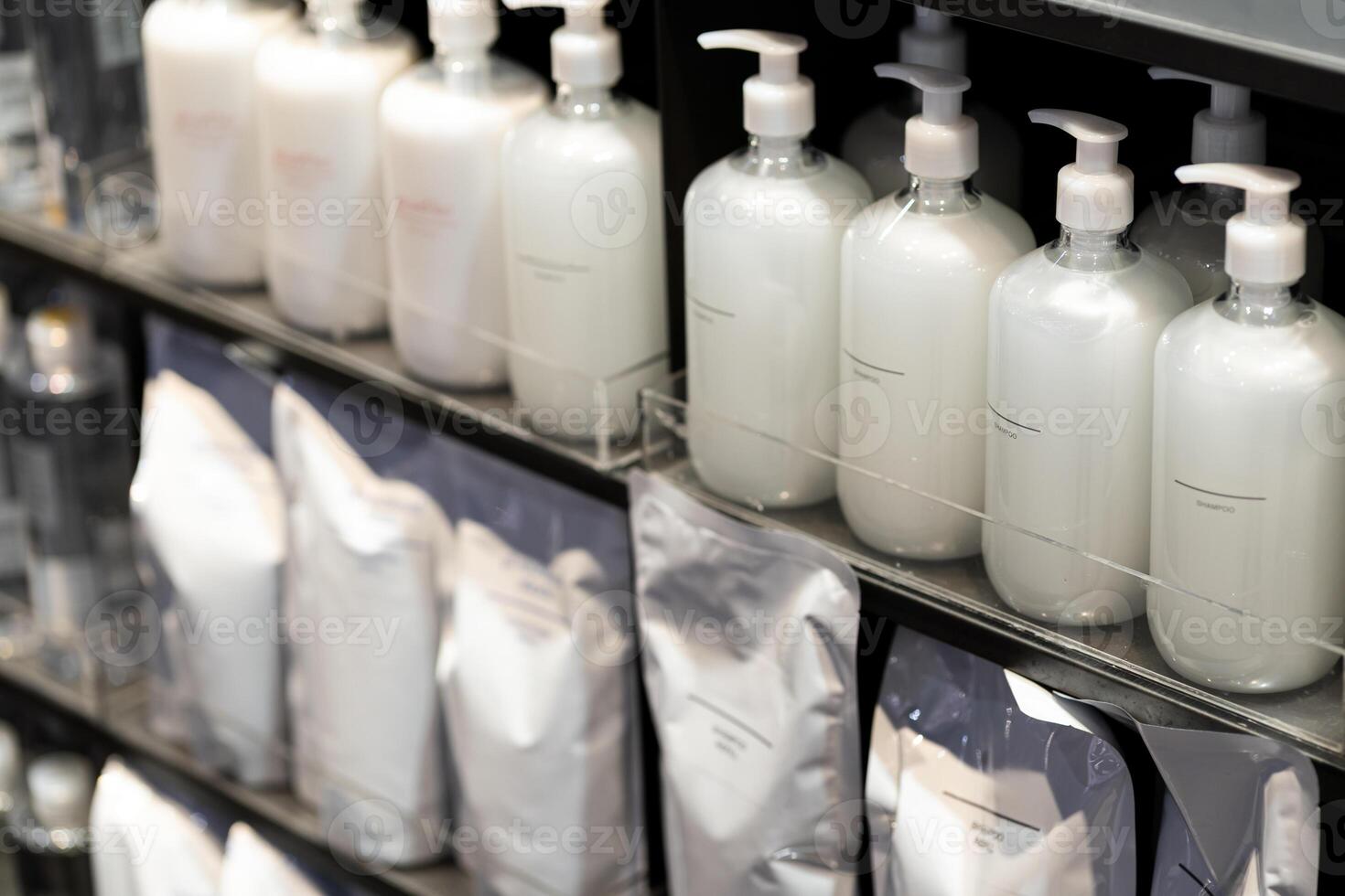 Refill to reduce plastic waste. soap or shampoo for refill. plastic bottles for refill liquid soap, shampoo and other products. Reusable Bottles for Soap and Shampoo in Zero Waste Lifestyle. photo