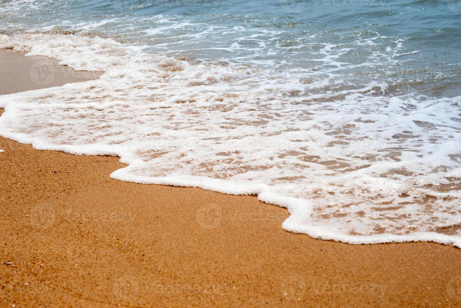 The beach and blue wave in the evening. photo
