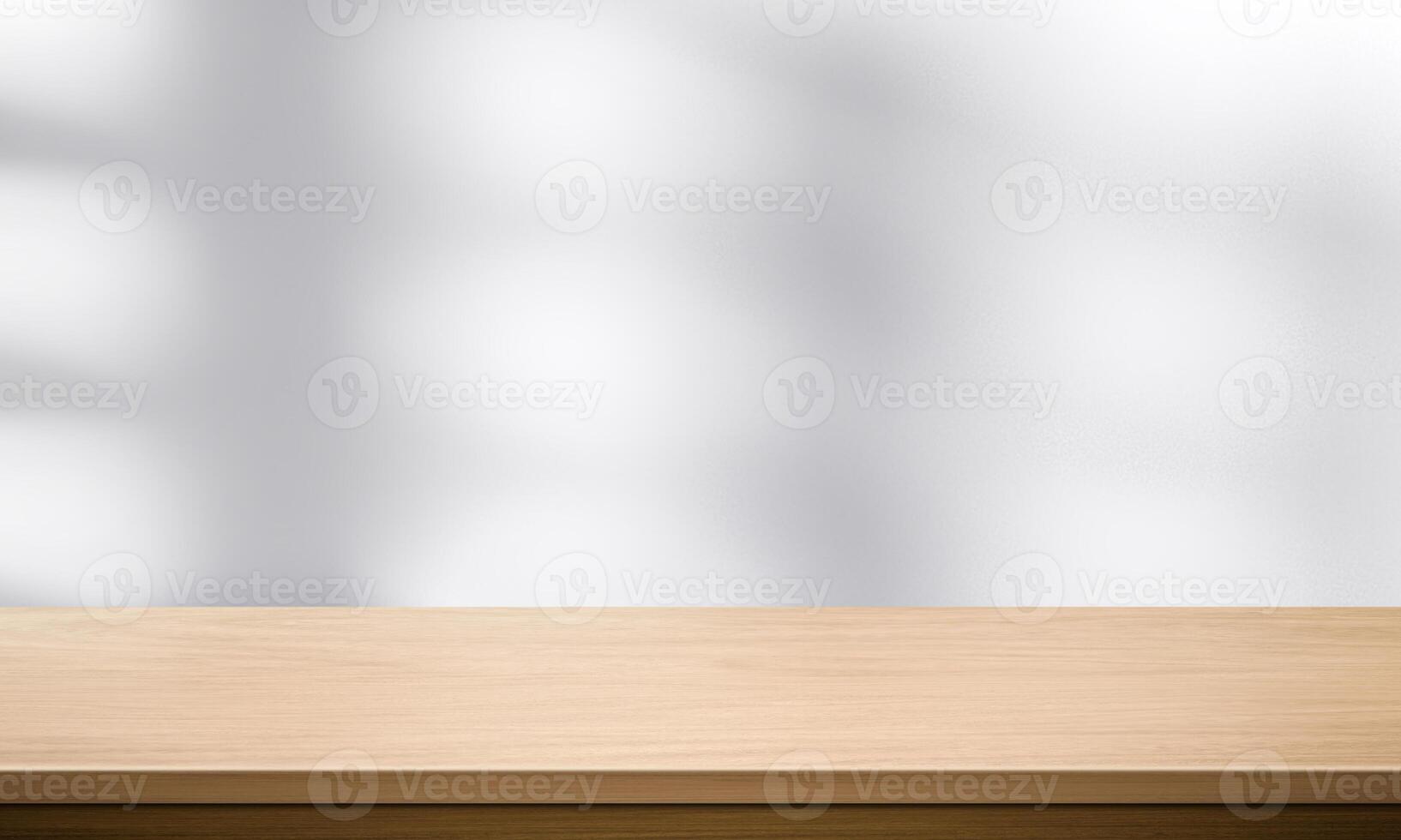 Wood table top and blurred wall shadow leaves window background can used for display or montage your products15 photo