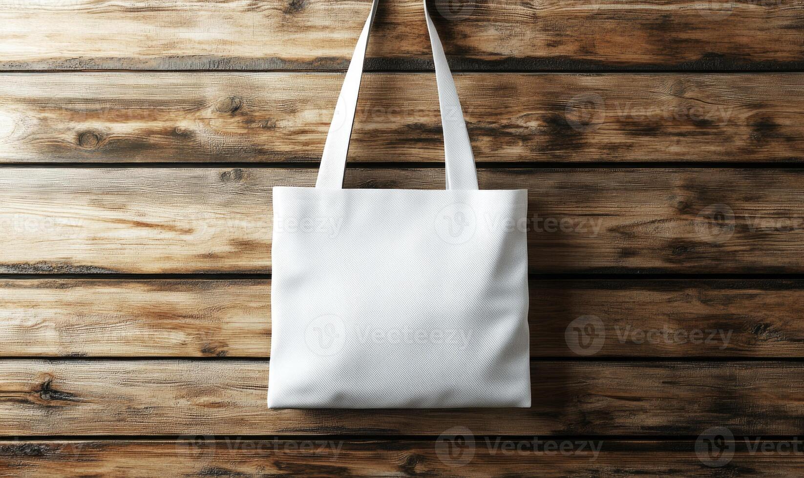 White tote bag mockup on wooden wall photo