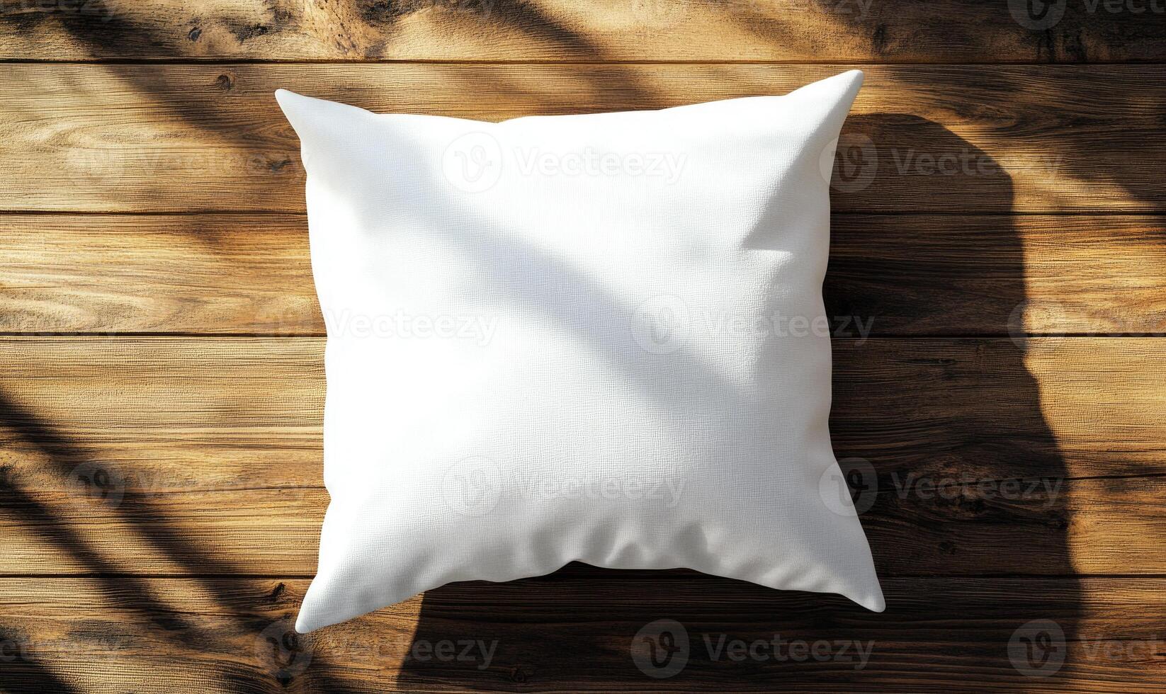 blank white pillow mockup on wooden background photo