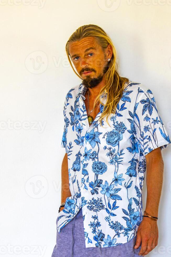 Attractive Man and Model with Long Hair and Open Shirt. photo