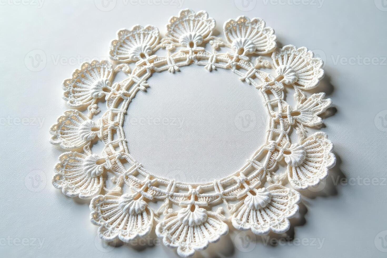 A white crochet lace with flowers on it photo