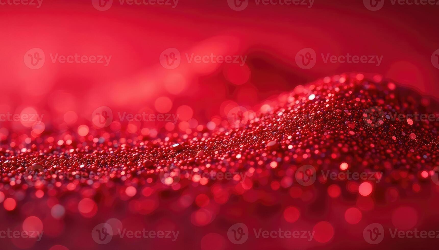 Red glittering particles on a red background photo
