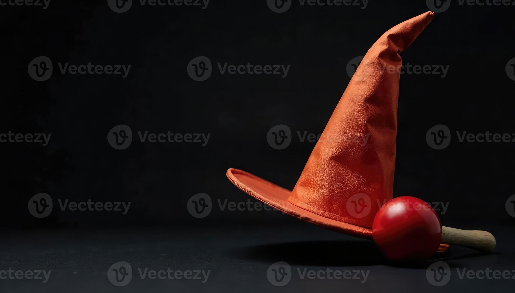 A red hat with a witch's hat on top photo