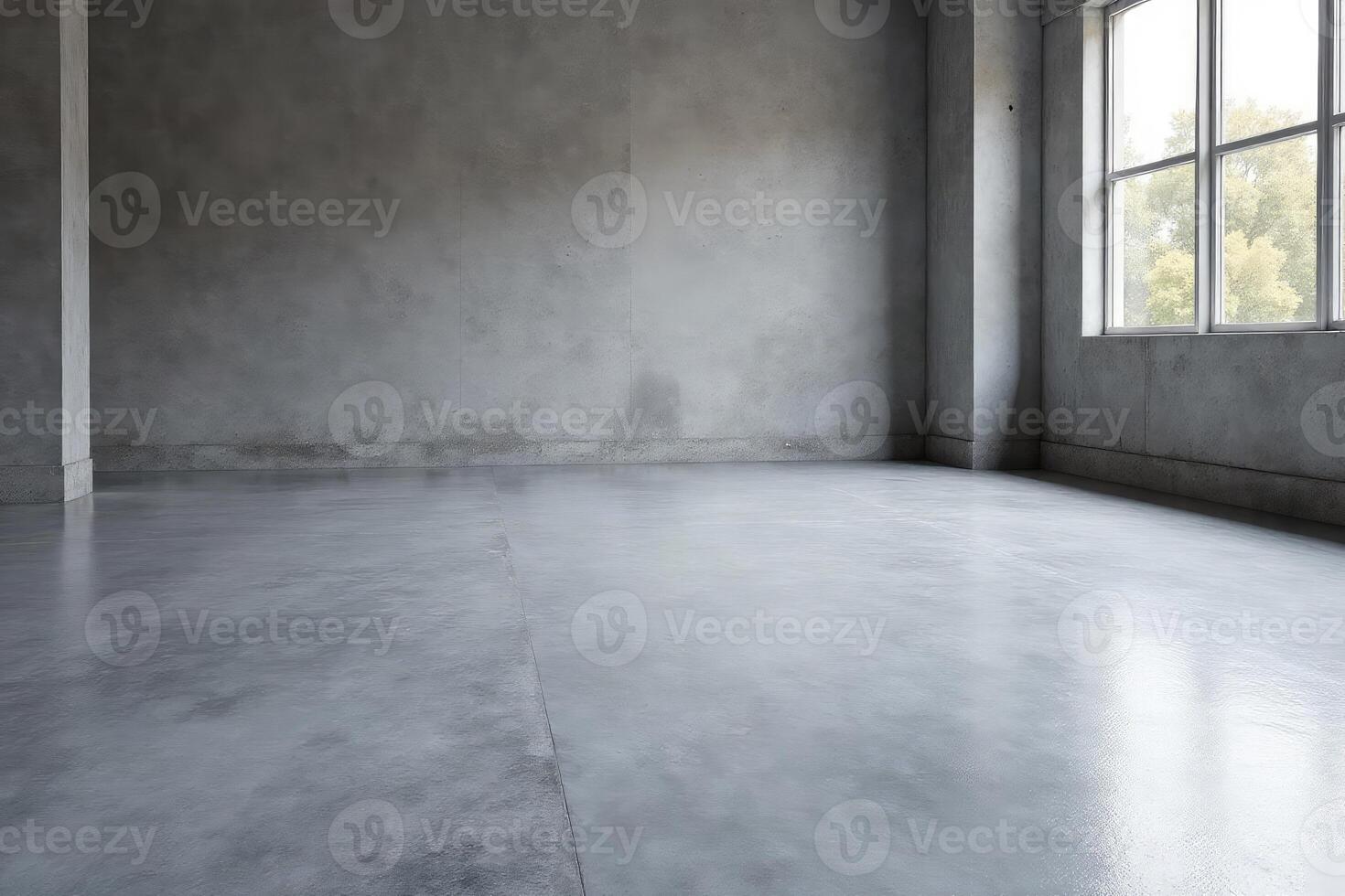Empty room with concrete floor and large windows photo
