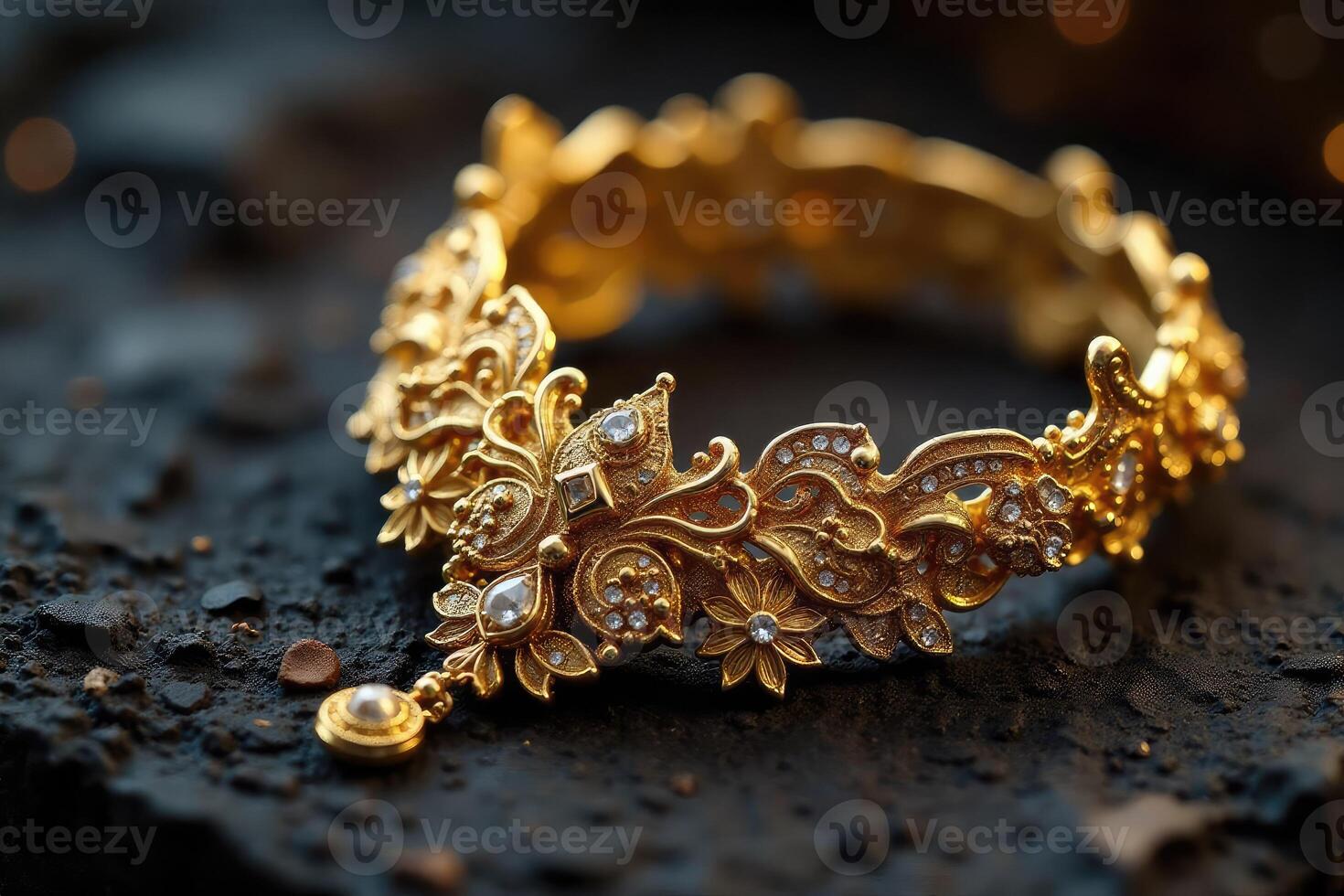 An ornate gold bracelet with diamonds photo