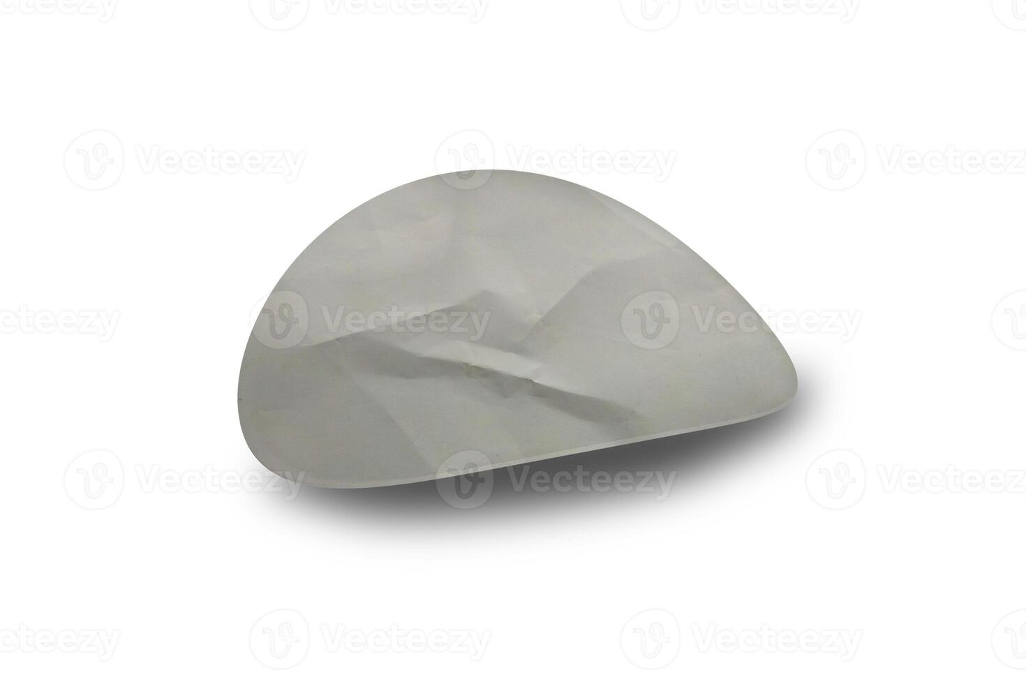 A white stone with a small hole in it photo