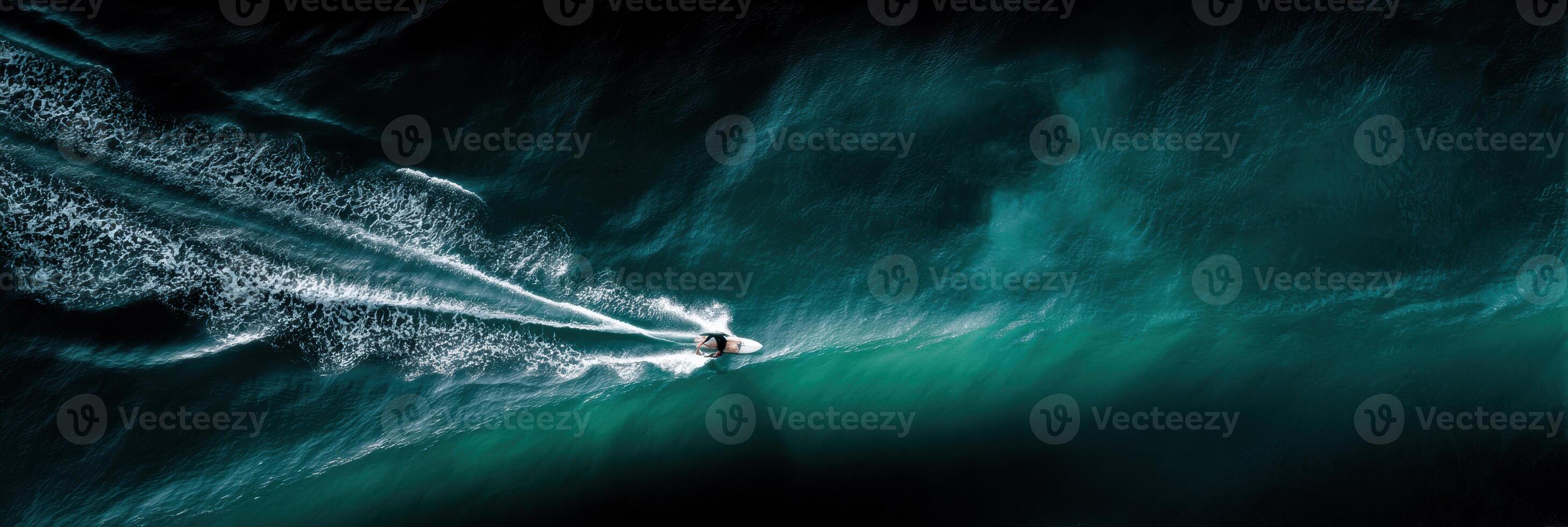 Aerial view of a jet ski rider in the ocean photo