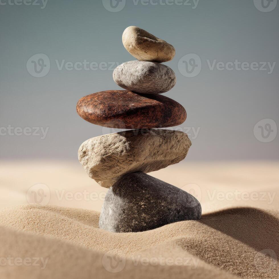 A stack of stones in the sand photo