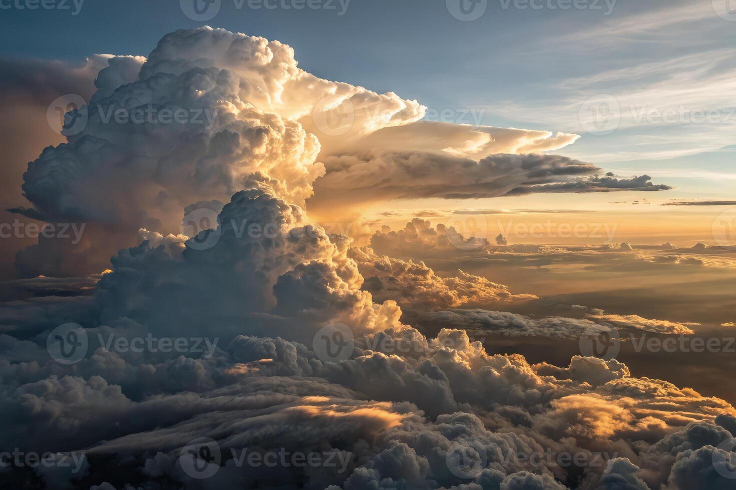 High altitude view of a dramatic storm front at sunset displaying immense cloud formations photo