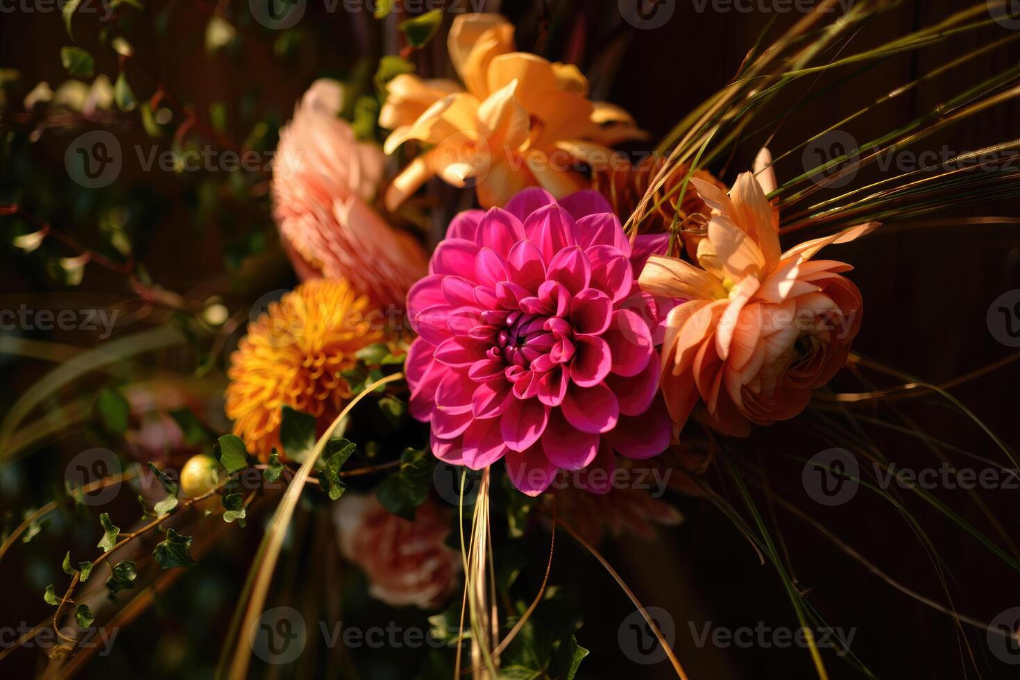 Close-up view of a vibrant dahlia with other colorful flowers in a beautiful bouquet. photo