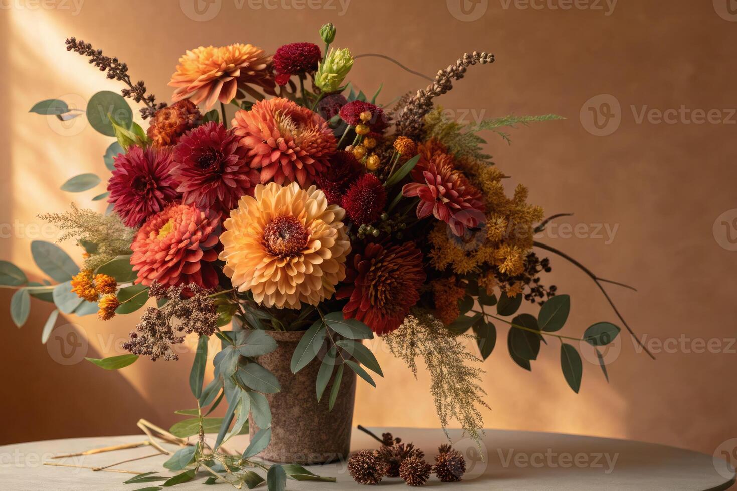 A stunning autumn floral arrangement, showcasing warm hues of orange and red, beautifully composed. photo