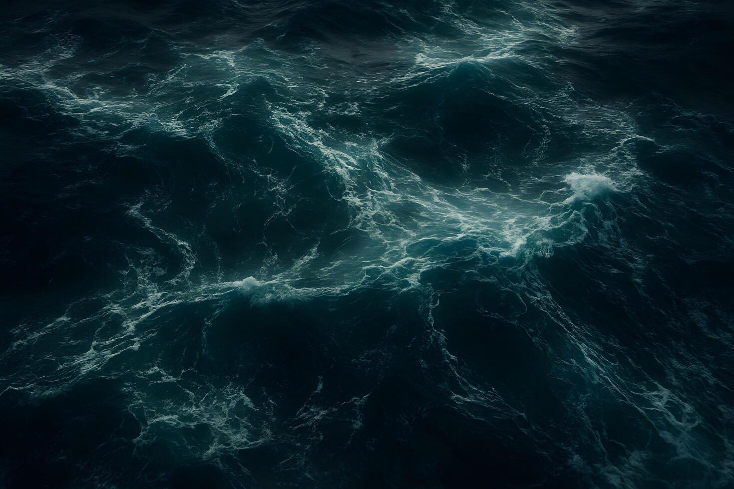 A dark ocean with waves and dark water photo