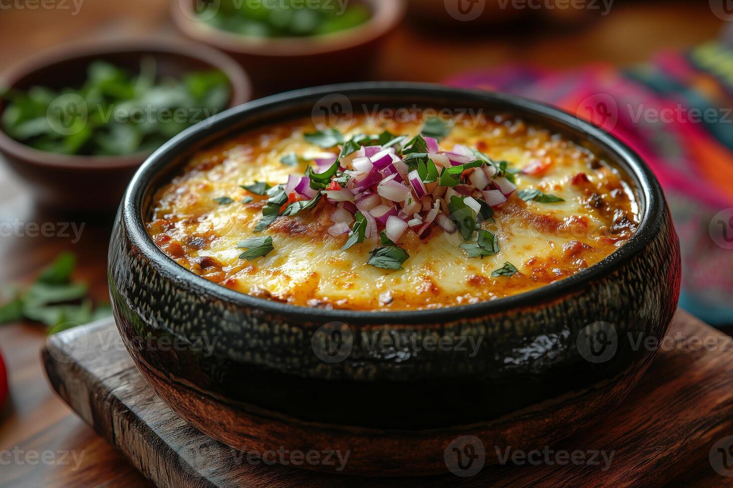 Bhutanese ema datshi, a spicy chili and cheese stew, served in a ceramic bowl with red rice on the side photo