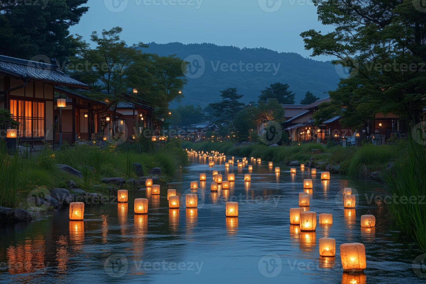 an illuminated river with floating lanterns during Obon, reflecting warm lights on the water photo