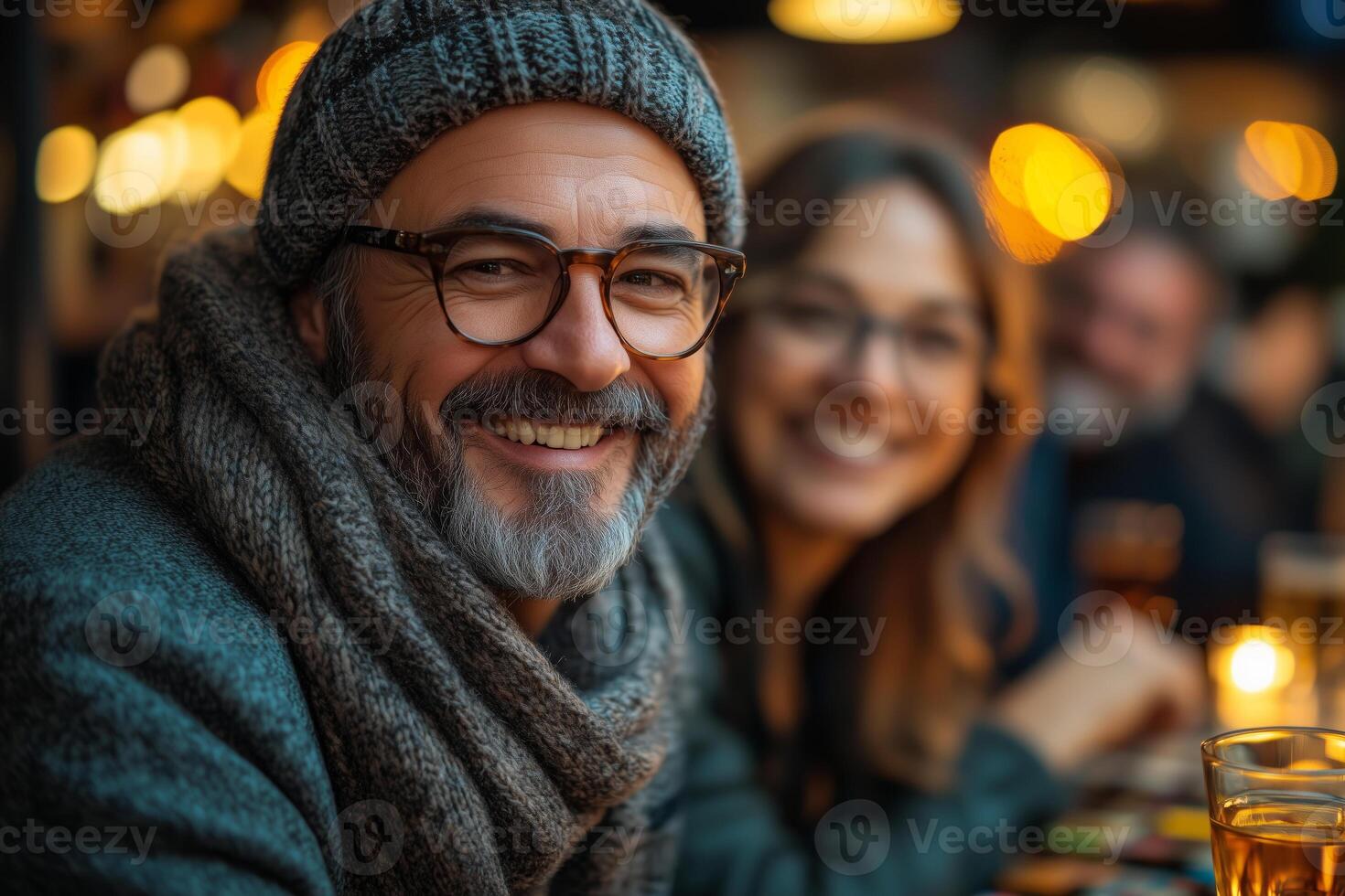 a group of elderly friends enjoying a board game night at home photo