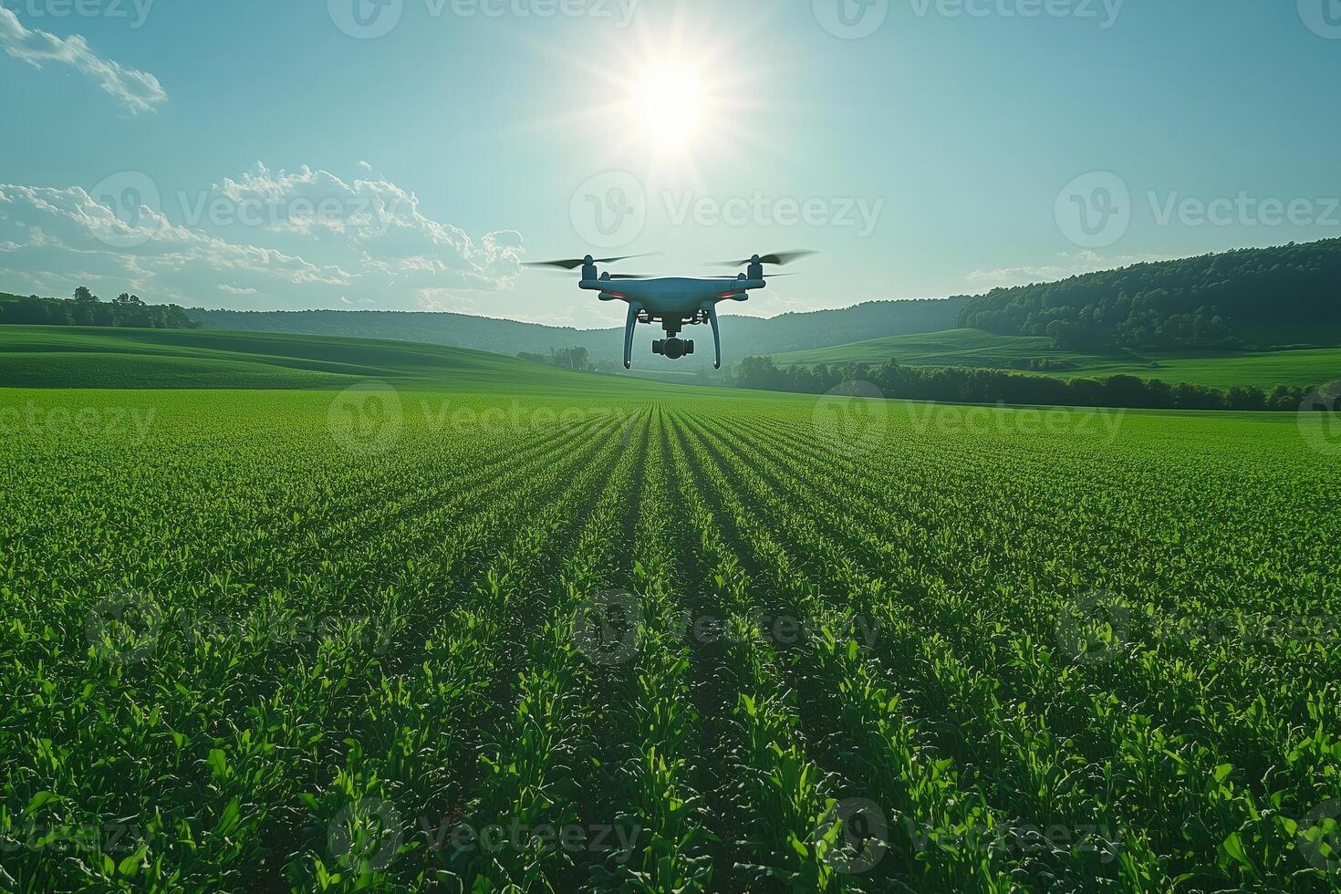 a drone flying over a large green field, capturing data for precision farming, with a scenic rural landscape in the background, bright sunny day photo