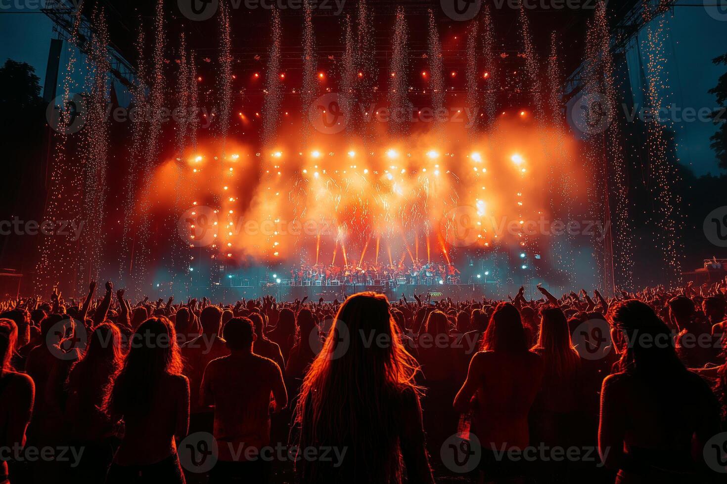 festivalgoers enjoying a live concert, with a brightly lit stage and vibrant lighting effects, the energy of the crowd photo