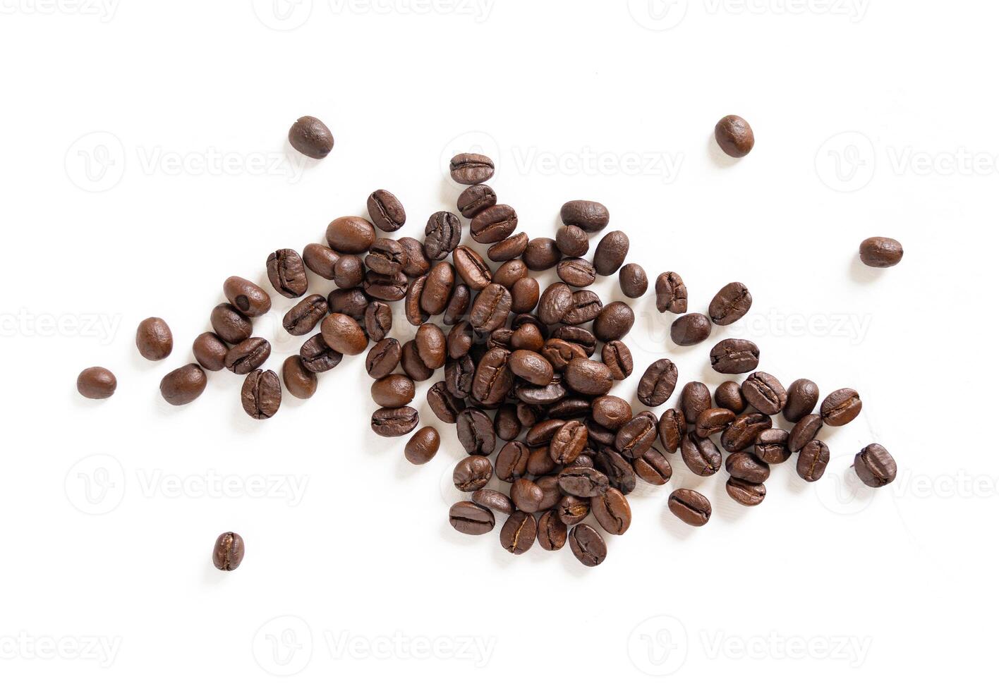 Brown roasted coffee beans seeds. Isolated of coffee bean on white background. Close up image. photo