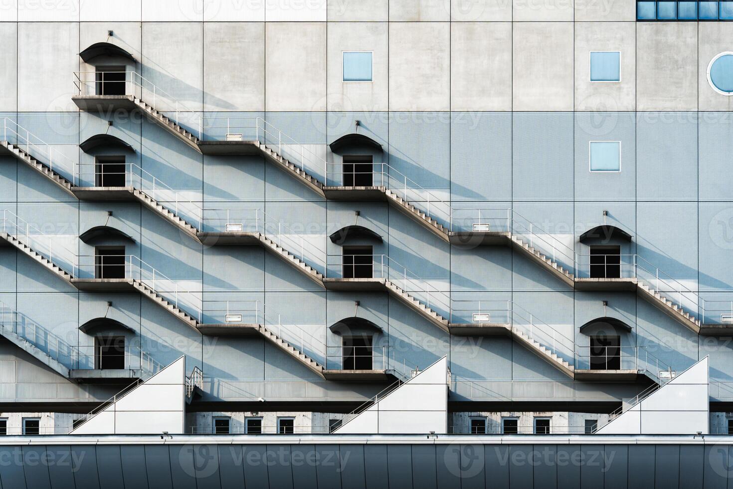 Geometric harmony of fire escapes stair with shadow and light photo