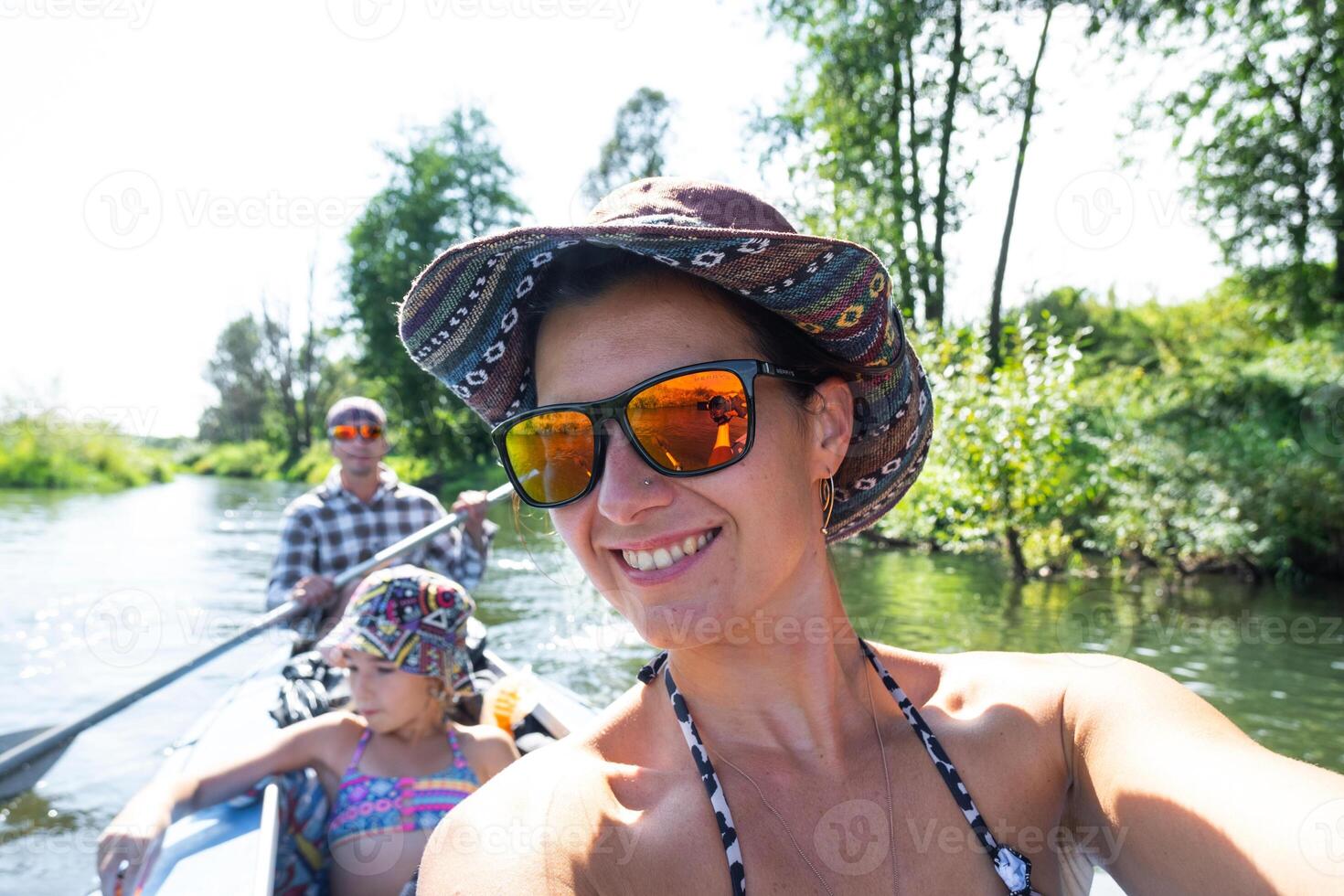 A woman and her daughter in a canoe photo