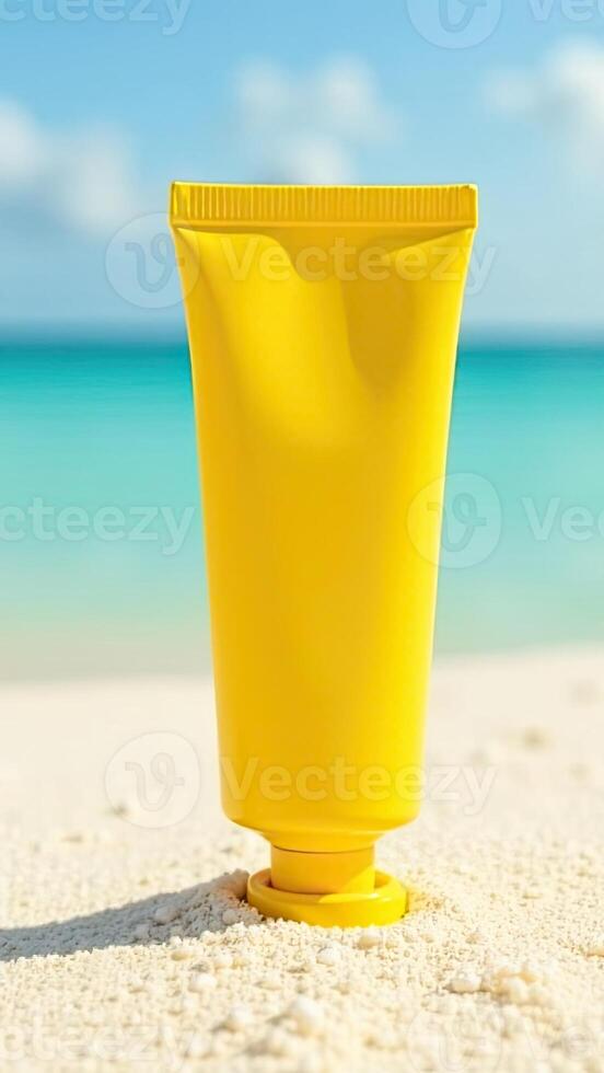 A tube of sunscreen on the beach photo