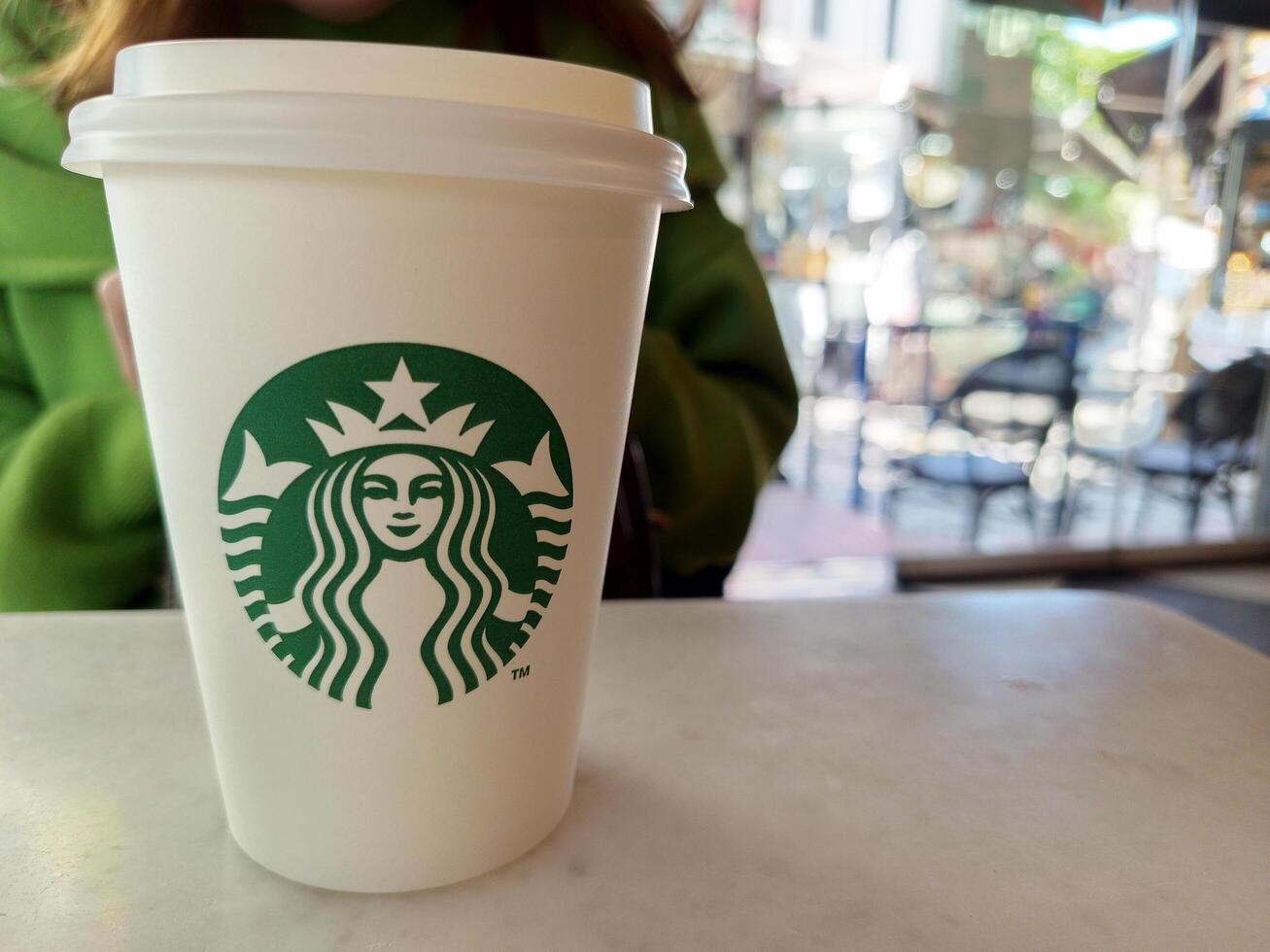 Turkey, Istanbul 11 May 2025 Starbucks cup in a coffee shop. photo
