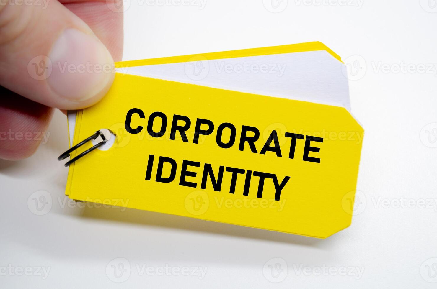 Corporate identity design idea highlighted on yellow sticky note for visual and verbal alignment. photo