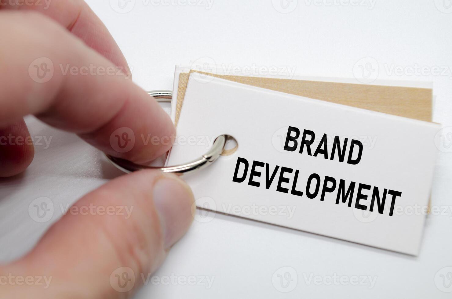 Brand development message emphasized on white note emphasizing visual and value expansion. photo