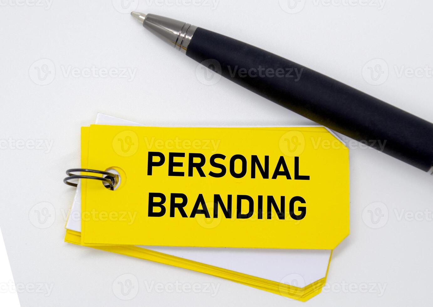 Personal branding idea shown on yellow sticky emphasizing individuality and self image marketing. photo
