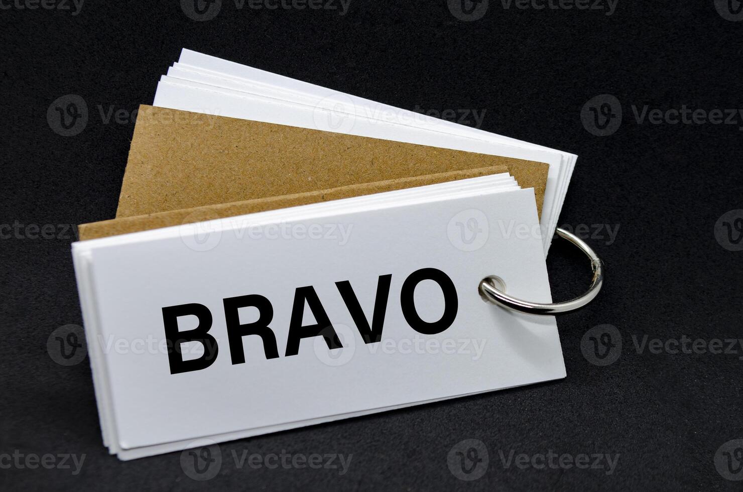 BRAVO text on white notepad. A Simple Gesture, A Powerful Message of Recognition and Encouragement. photo