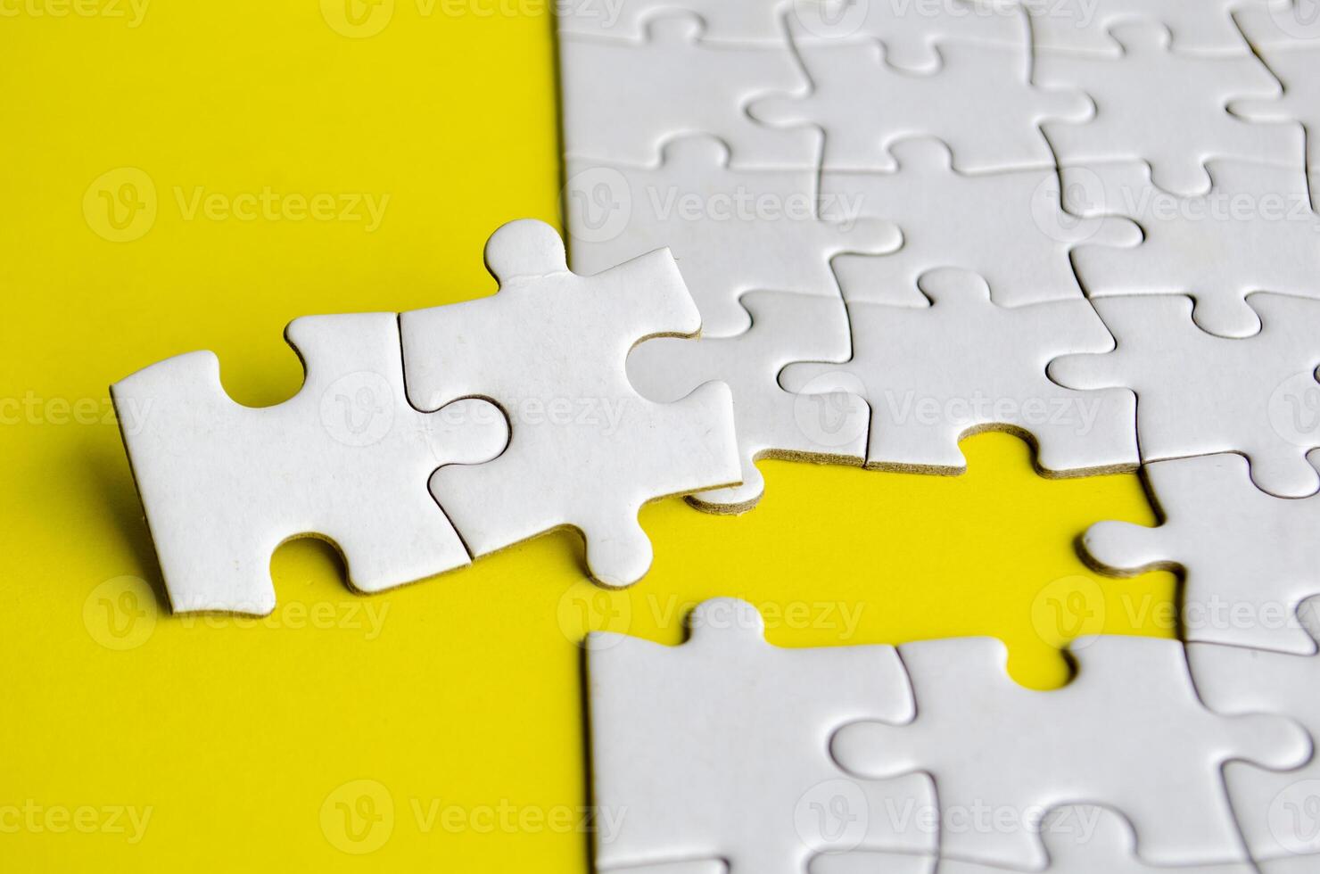Close up of missing jigsaw puzzle pieces. Solution concept photo