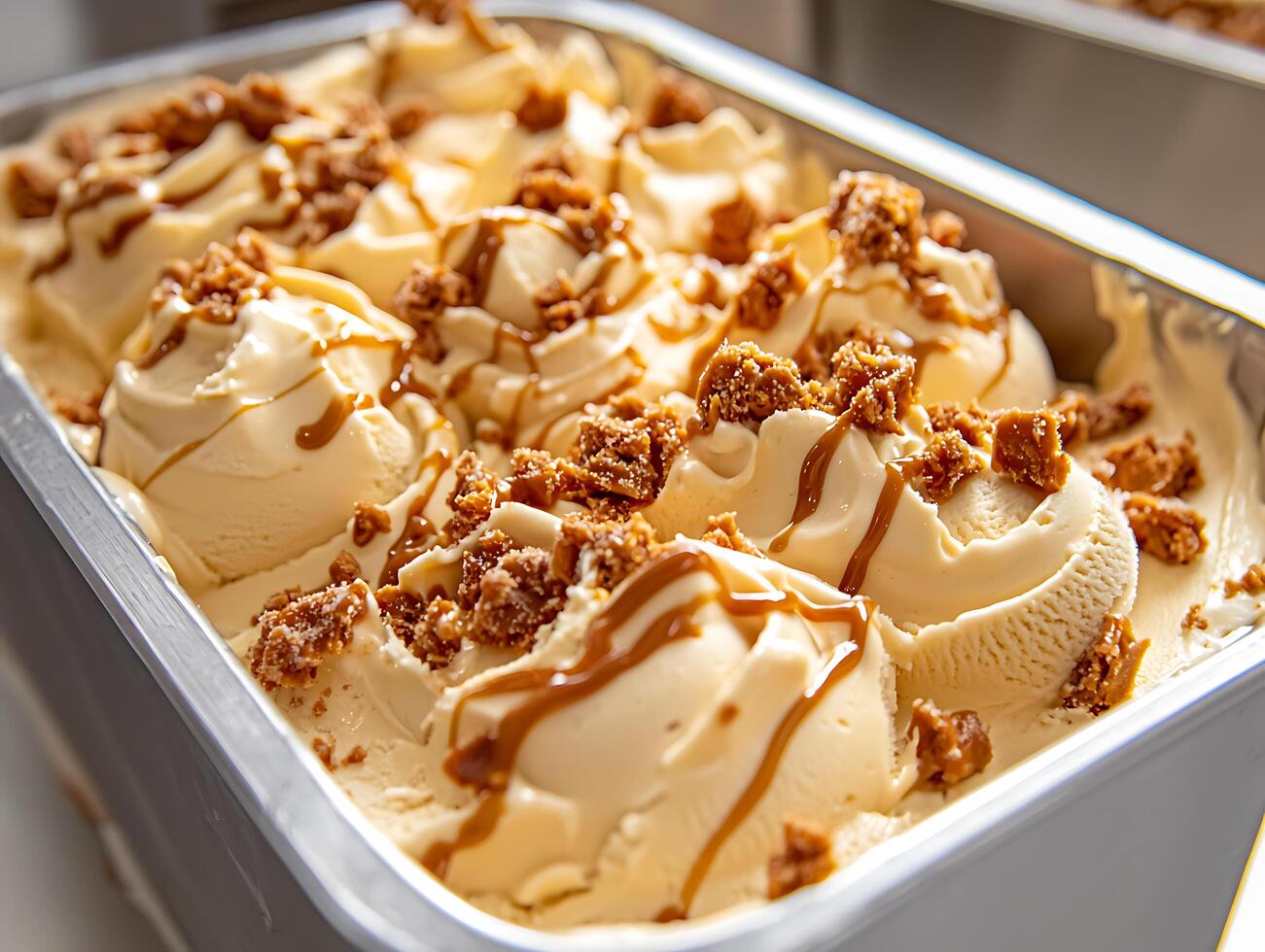 Caramel ice cream with toffee pieces photo