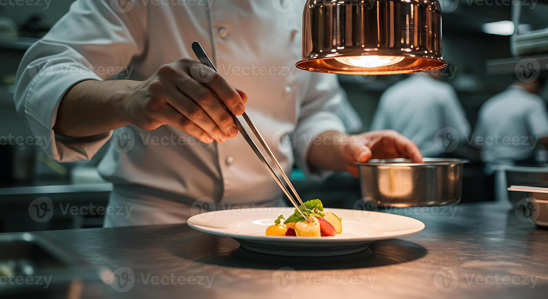 Chef preparing food in kitchen with a light bulb photo