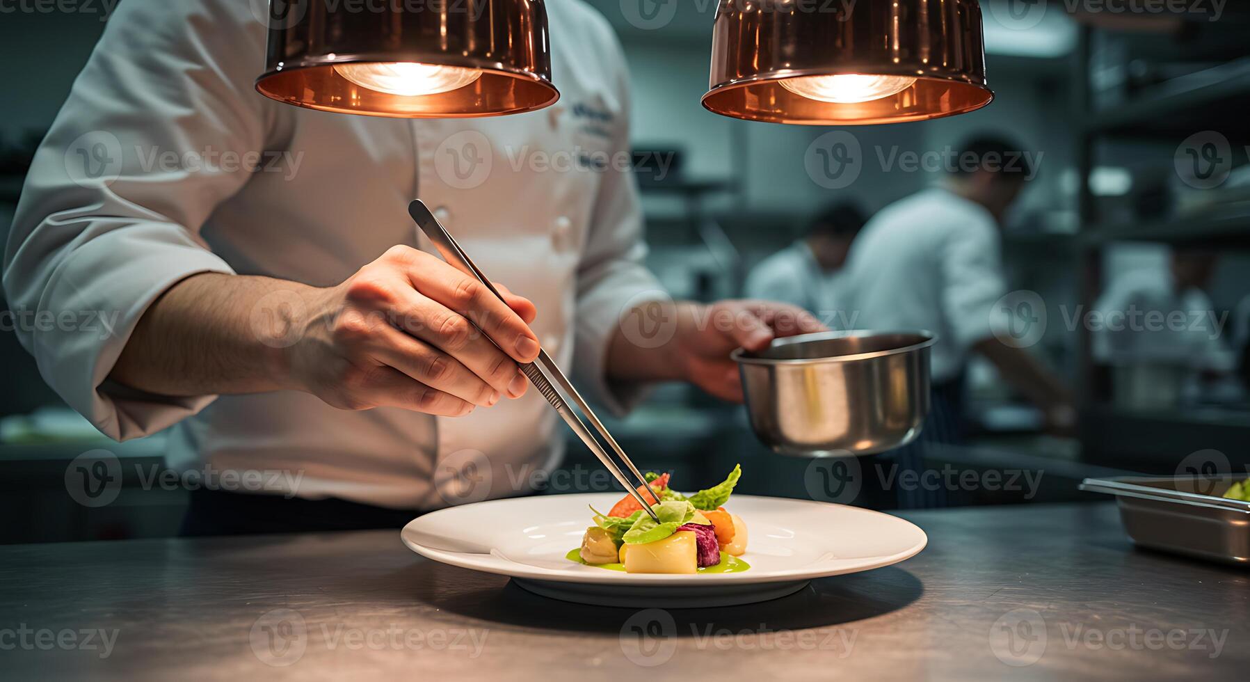 A chef is preparing food in a restaurant kitchen photo
