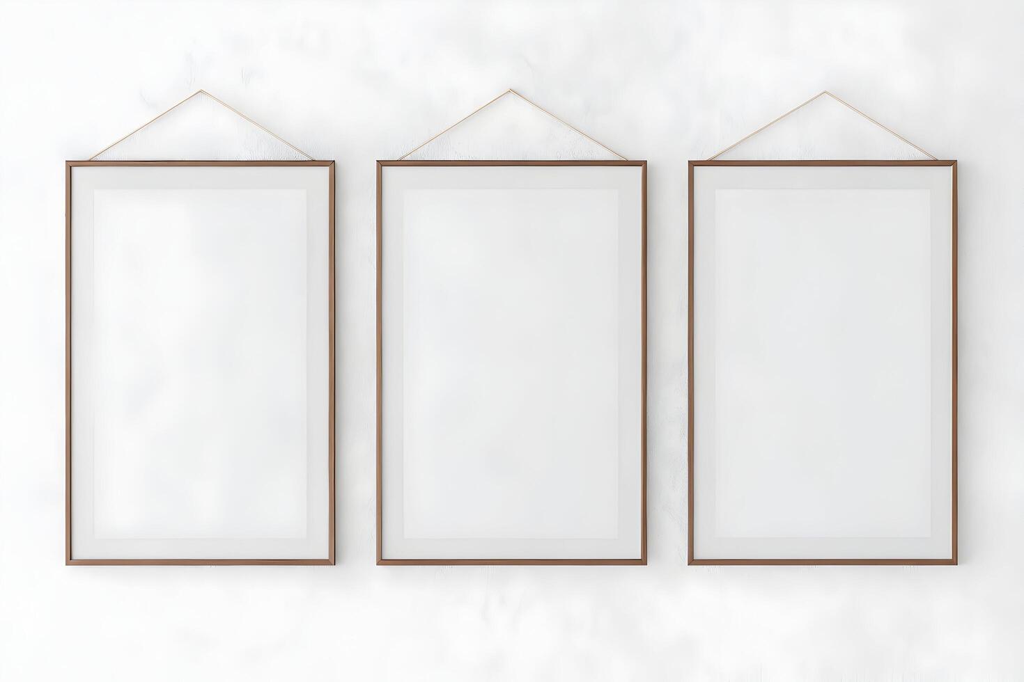 Elegant Trio of Frames A Subtle Presentation on a Minimalist Textured Wall photo