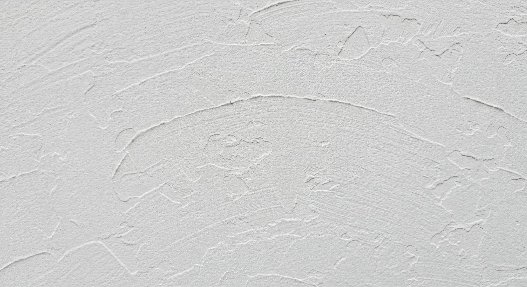 Subtle interplay of light and texture on a meticulously applied white wall photo