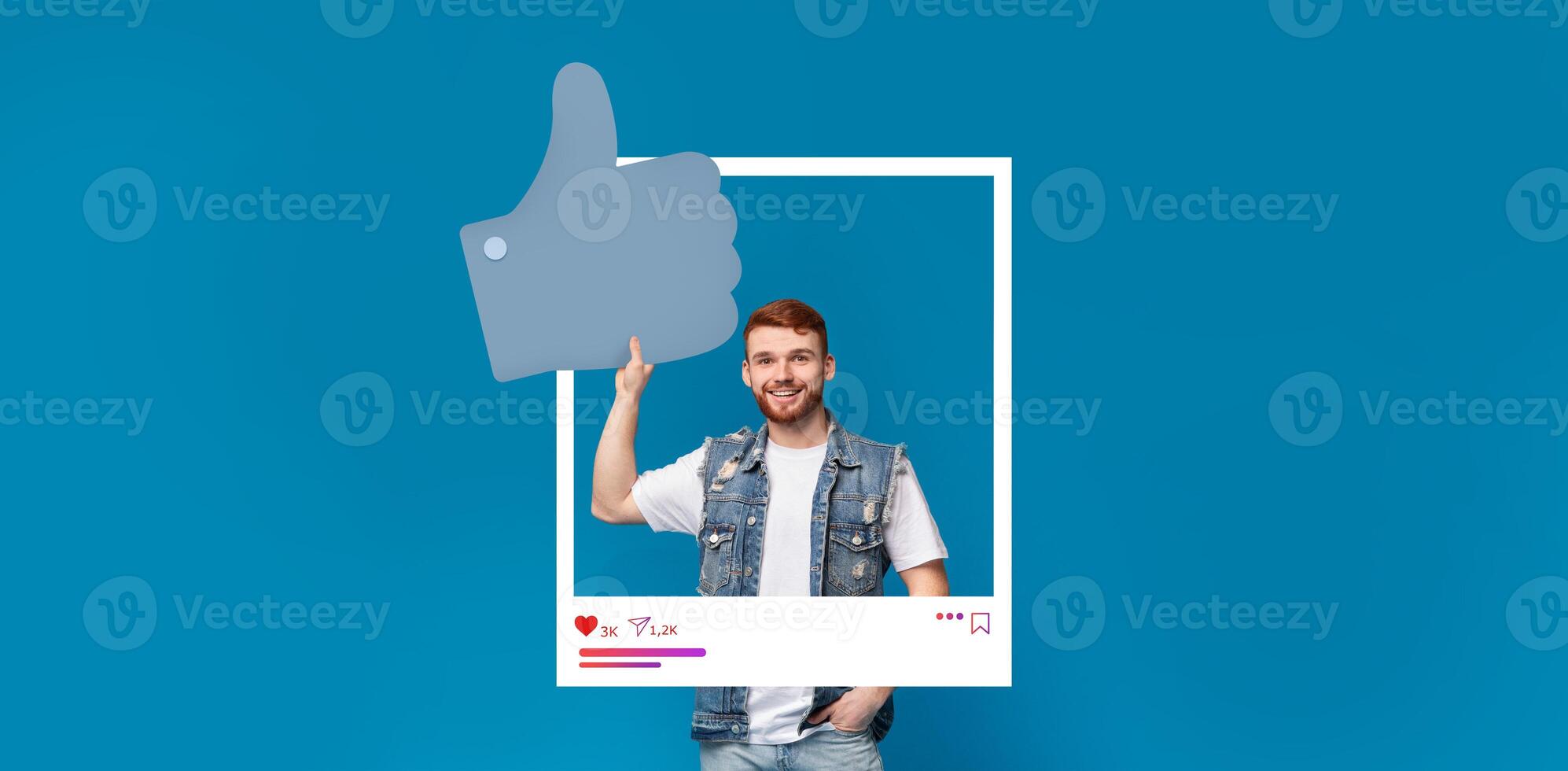 A young influencer confidently gives a thumbs up while standing in front of a vibrant blue background. The dynamic setting captures the essence of online content creation and community engagement. photo