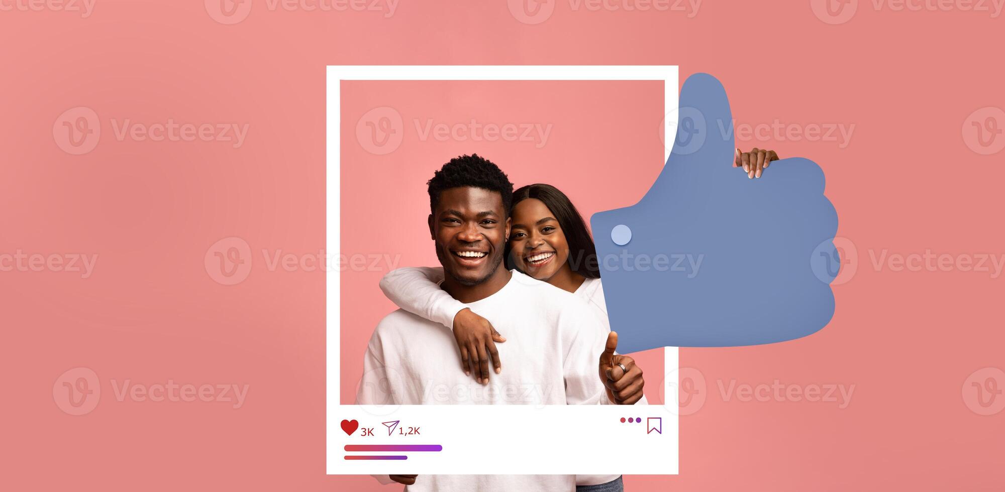 A young couple smiles brightly while posing against a colorful background. They celebrate moments of happiness with a thumbs up, symbolizing positivity in online content creation and connection. photo