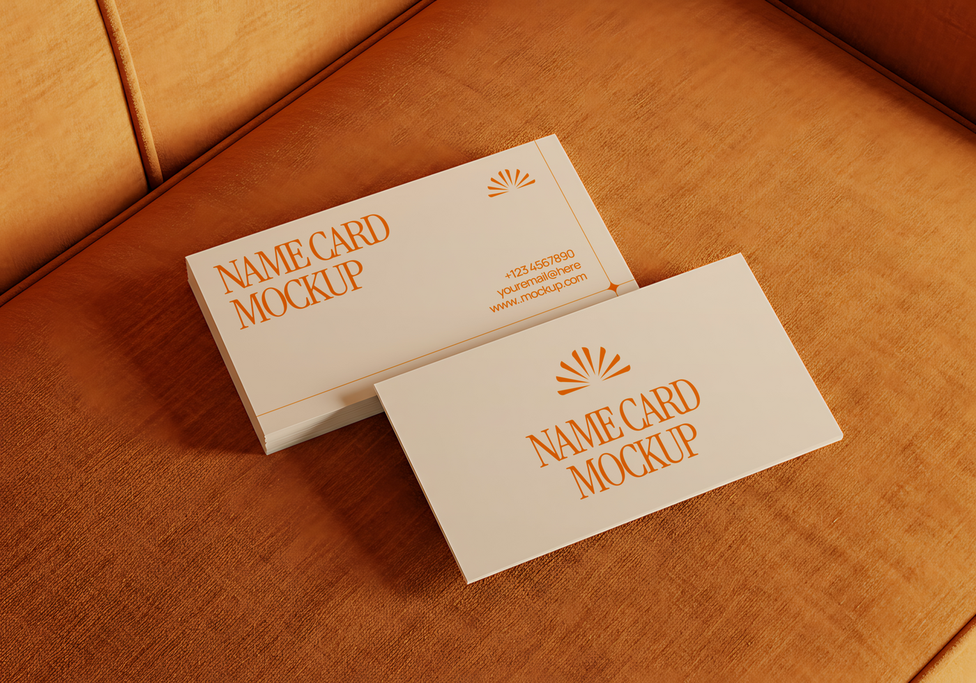 Two minimalist name card mockups rest on a burnt orange velvet surface psd
