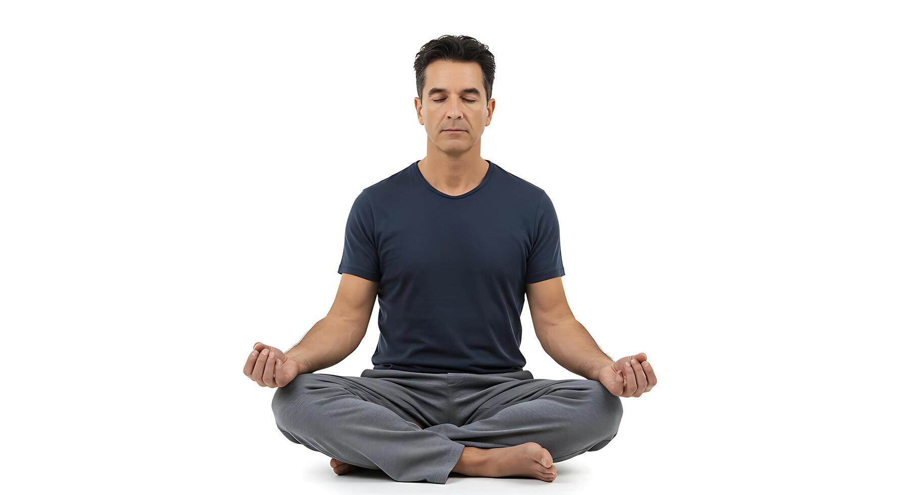 A man sitting in a lotus position with his hands crossed photo
