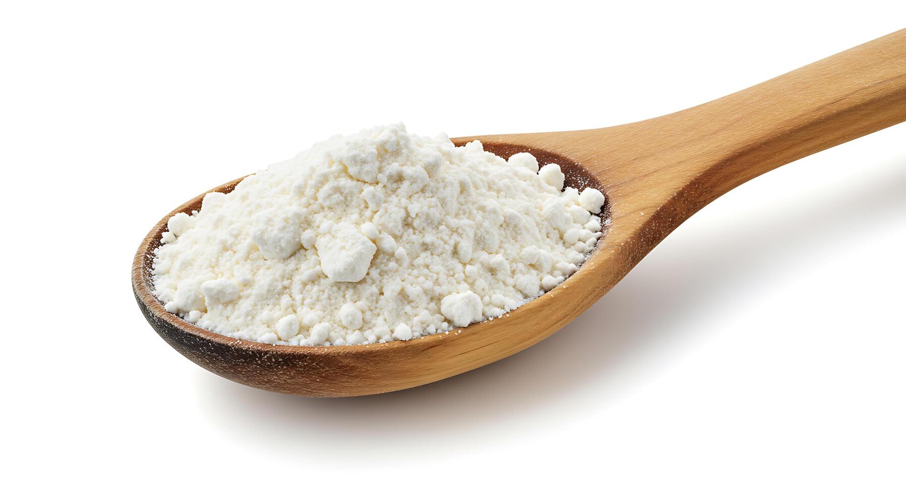 A spoon full of white powder on a white background photo
