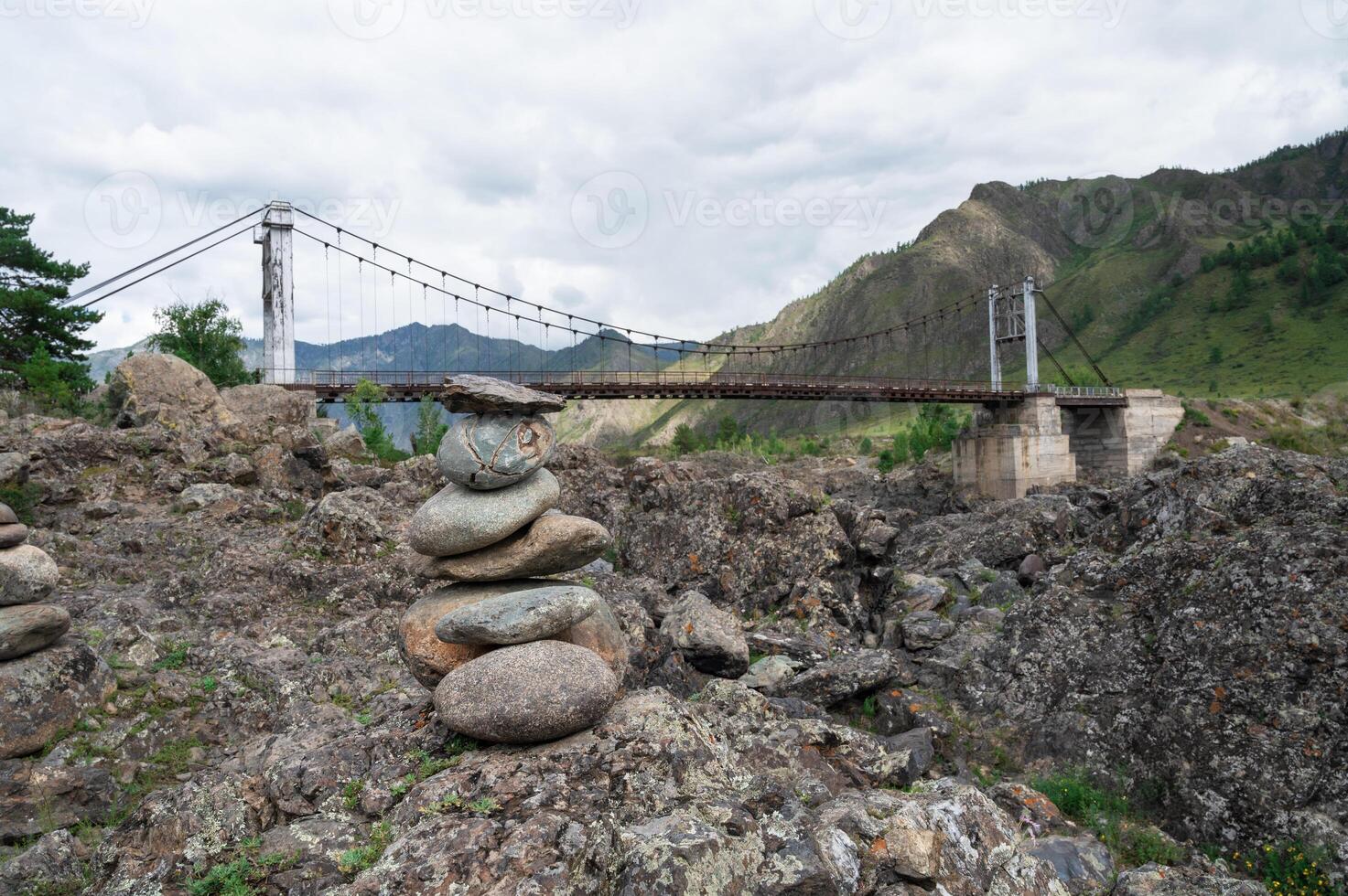 Fast mountain river Katun and Oroctoy bridge in Altay, Siberia, Russia. photo